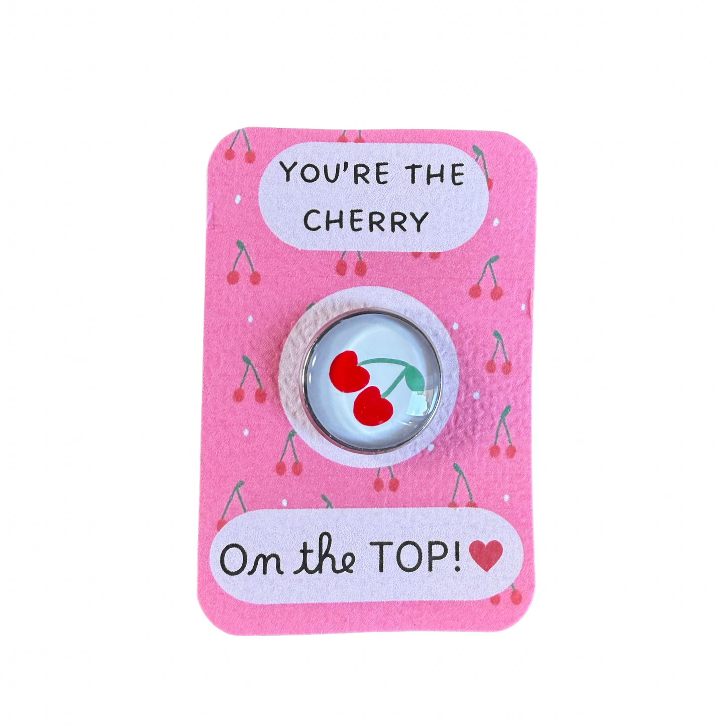 Pin’s cabochon Dans l’air du temps