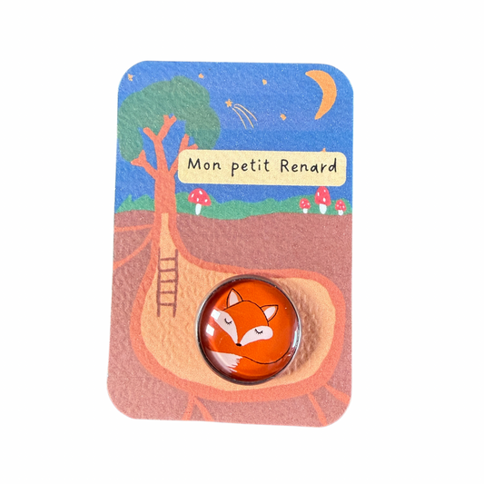 Pin’s cabochon Dans l’air du temps